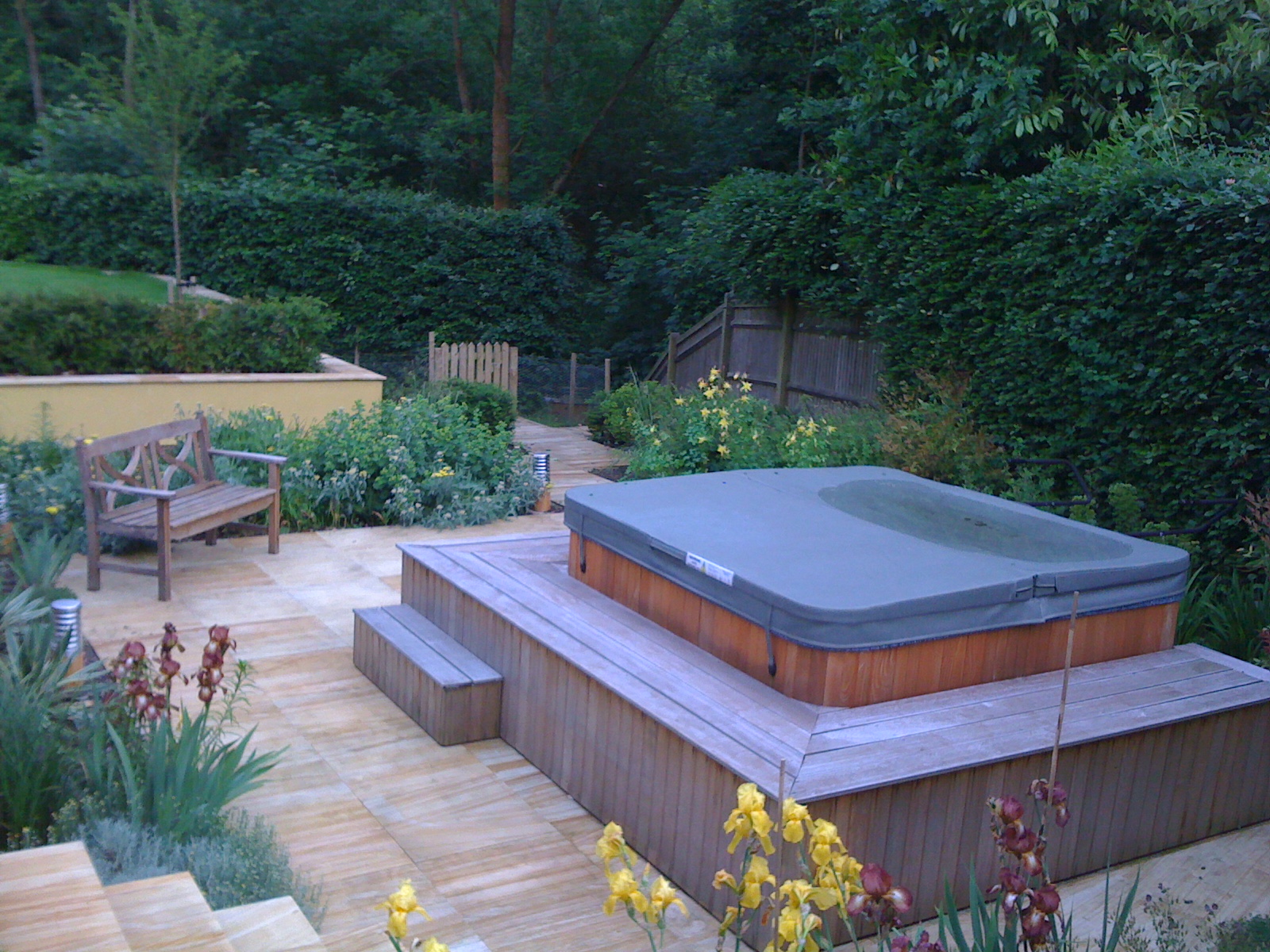 The sunken garden with hot tub.n, the yew hedges are still to reach ...